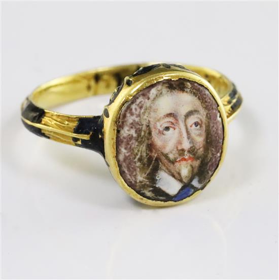 A rare mid 17th century enamelled gold oval memorial ring for Charles I (1600-1649), finger size K.
